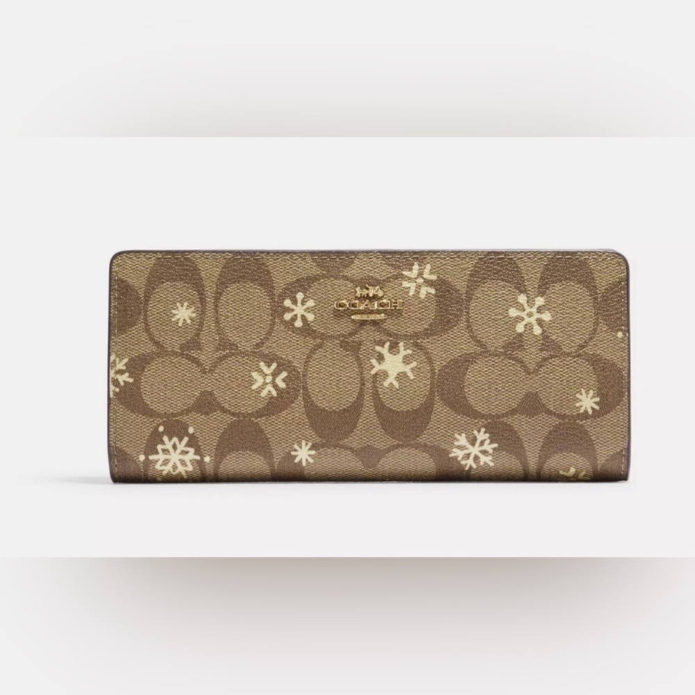NWT COACH North South Bi Fold Wallet In Signature Canvas w/ Star&Snowflake Print